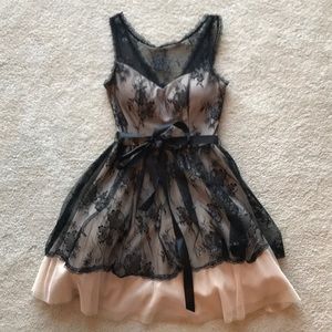 B. Smart black lace overlay dress